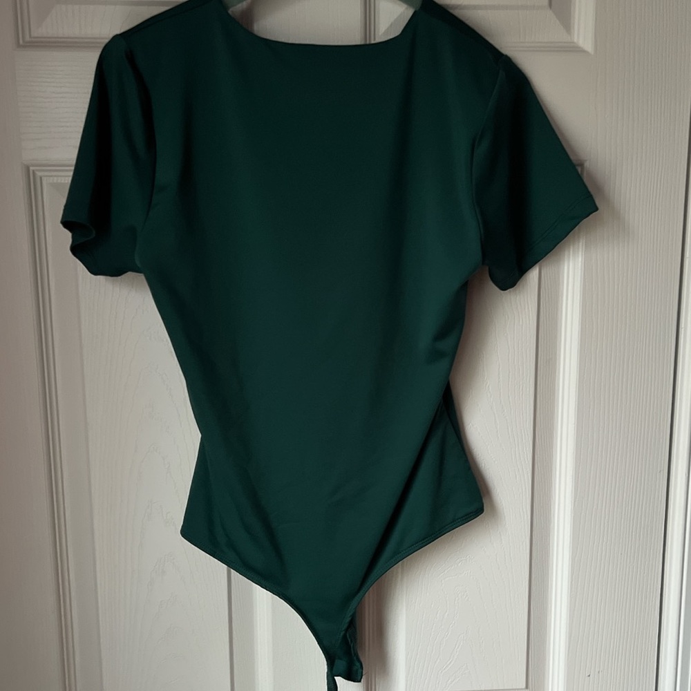green bodysuit